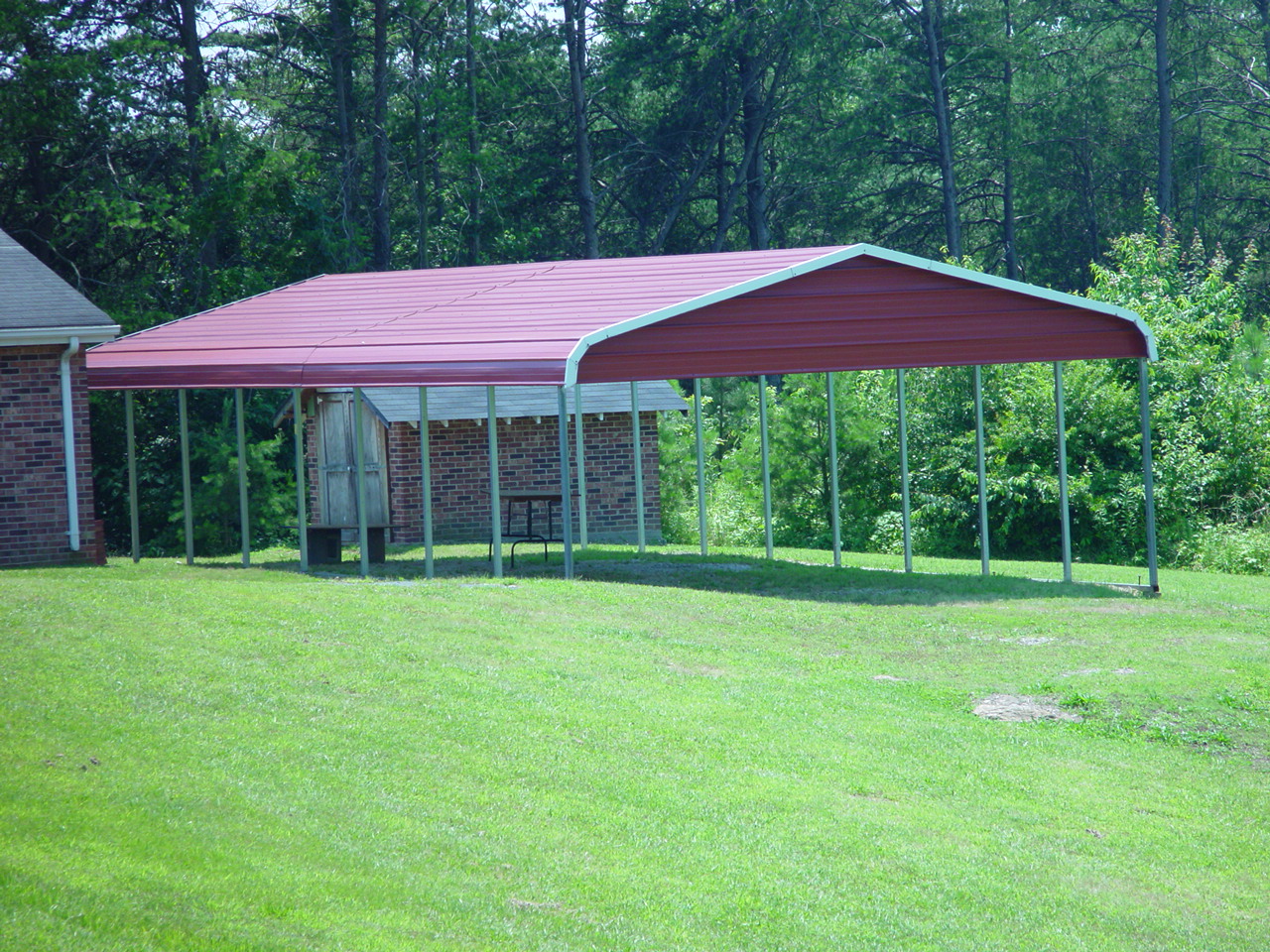 garden-yard-gazebo Garden yard gazebo with red gables, roof, and white trim.