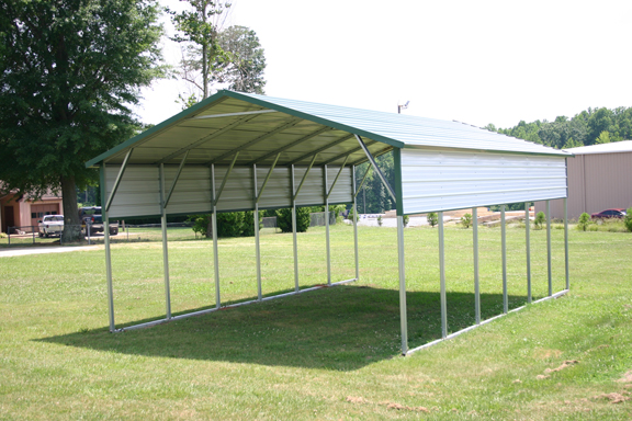 patio-cover White Metal Patio Cover with green trim and extra panels on the side.